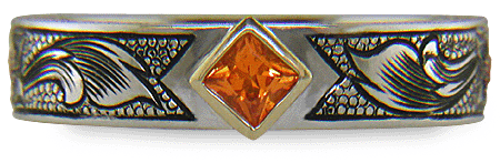 A beautifully hand-engraved ring set with fiery orange Manderin Garnets. (J8703)