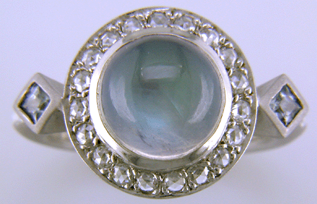Moonstone and Rose-cut Diamond ring custom crafted in platinum. (J8519)