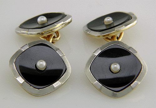 Cufflinks and stud set featuring onyx and pearls set in 14kt gold. (J5131)