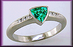 Trillium Paraiba tourmaline accented with diamonds in a custom platinum ring.