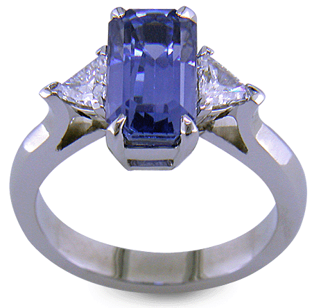 Hand-crafted platinum ring with a emerald-cut pastel Sapphire and sparkling diamonds. (J8541)