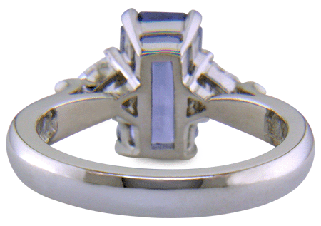 Hand-crafted platinum ring with a emerald-cut pastel Sapphire and sparkling diamonds. (J8541)