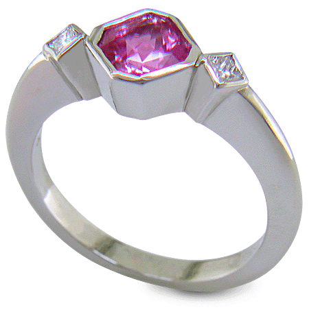 Pink Sapphire set with two Princess-cut diamonds in a platinum ring. (J8547)