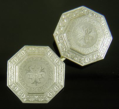Elegantly engraved platinum and gold cufflinks. (J9333)