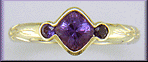 Cushion-cut Purple Sapphire with round Purple Sapphires in a custom platinum ring. (J8546)