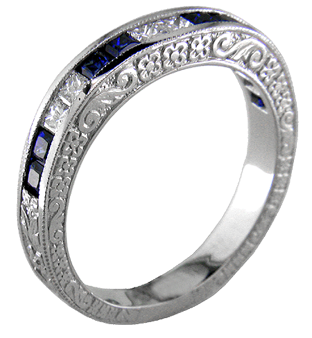 Striking platinum band set with princess-cut diamonds and sapphires.