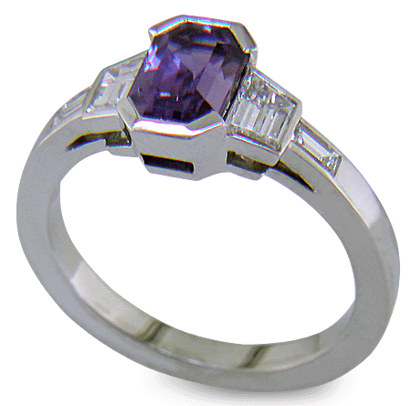 Purple sapphire and diamond handcrafted platinum ring.