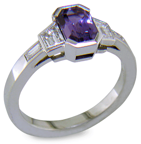Purple sapphire and diamond handcrafted platinum ring.