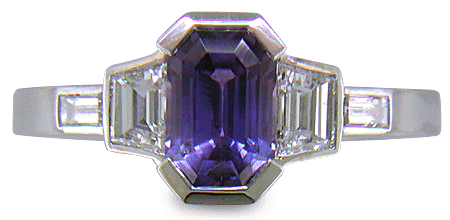 Purple sapphire and diamond handcrafted platinum ring.