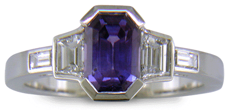 Purple sapphire and diamond handcrafted platinum ring.