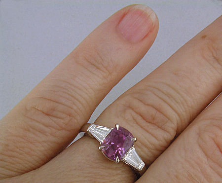 Purple Sapphire with tapered baguette diamonds in a custom platinum ring. (J8644)