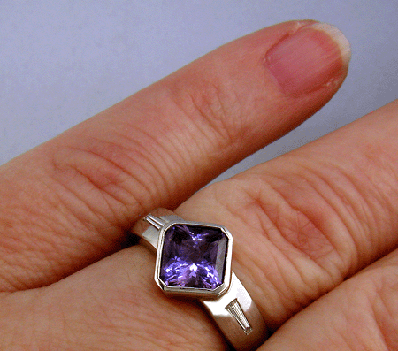 Purple sapphire and diamond handcrafted platinum ring.