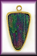 Rainbow Hematite and 18kt yellow gold earring jackets.