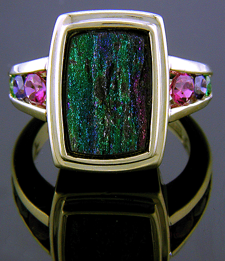 Rainbow hematite ring set with sapphires, tourmalines and tsavorites.