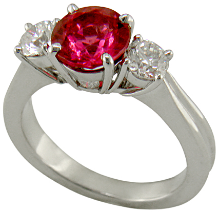 A Red spinel set with two ideal-cut diamonds in a beautiful platinum ring. (J7240)