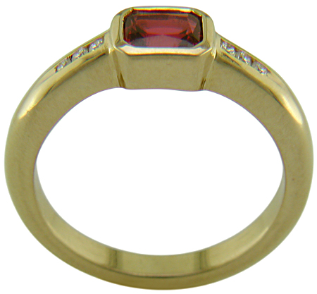 Emerald-cut Red Spinel set with round brilliant-cut diamonds in a handcrafted ring. (J6776)