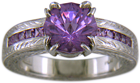 Lavender spinel set with sparkling lilac sapphires in a beautifully hand-engraved platinum ring.