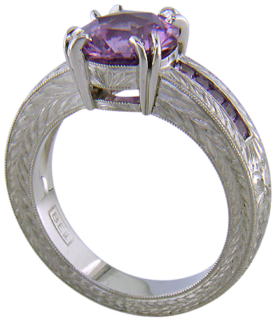 Lavender spinel set with sparkling lilac sapphires in a beautifully hand-engraved platinum ring.