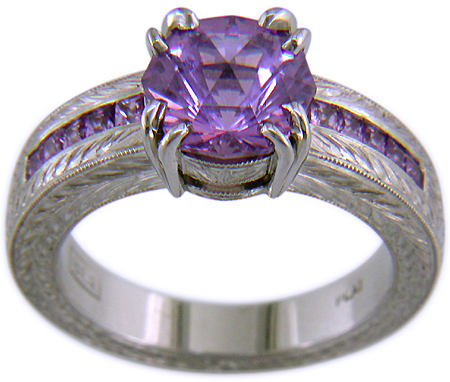 Lavender spinel set with sparkling lilac sapphires in a beautifully hand-engraved platinum ring.