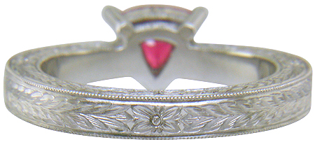 Hand engraved platinum ring with a trillium red spinel.