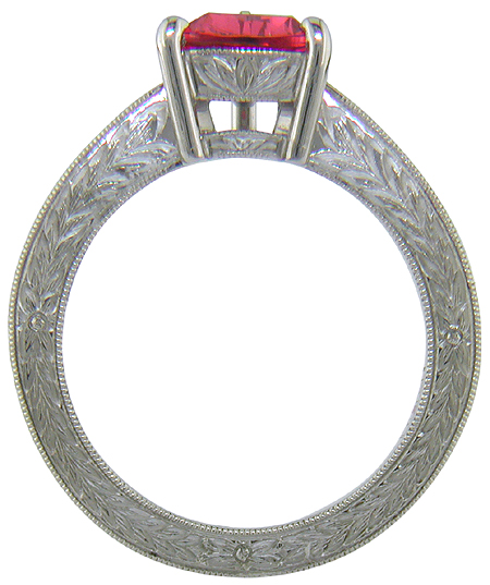 Side view of hand engraved platinum ring with a trillium red spinel.