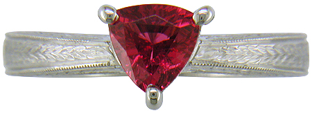 Hand engraved platinum ring with a trillium red spinel.