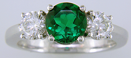 Diamond and emerald ring in platinum.