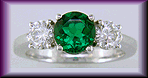 Diamond and emerald ring in platinum.