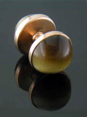 Sansbury & Nellis Tiger Eye cufflinks crafted in 14kt rose gold. (J8847)