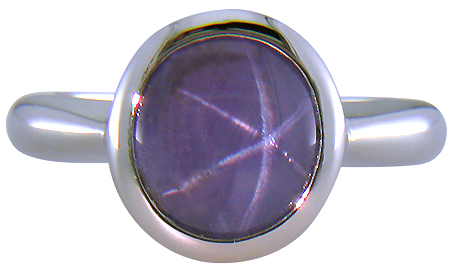 Purple star sapphire ring hand crafted in platinum.