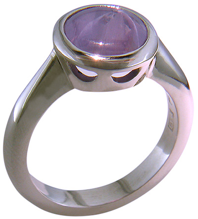 Purple star sapphire ring hand crafted in platinum.