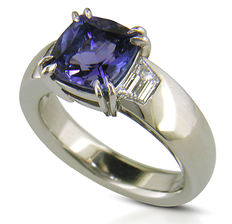 Custom tanzanite and diamond engagement ring.