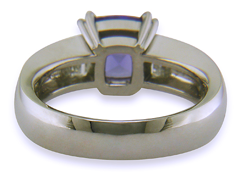 Custom tanzanite and diamond engagement ring.