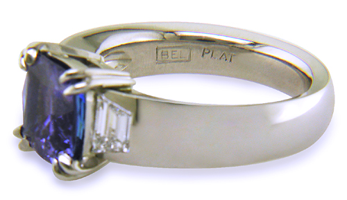 Custom tanzanite and diamond engagement ring.