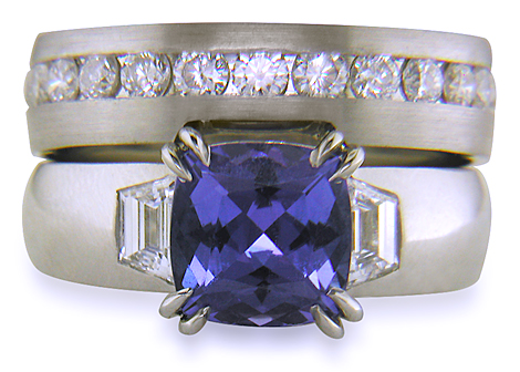 Custom tanzanite and diamond engagement ring and wedding band.