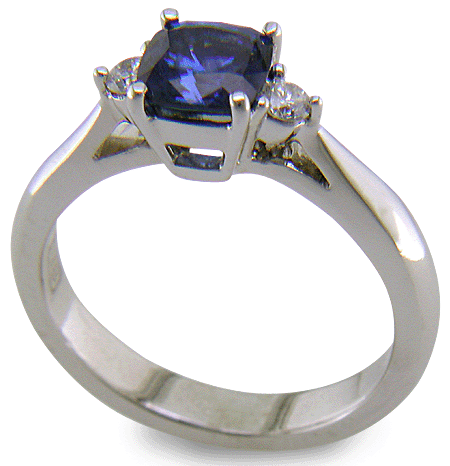 Square Cushion-cut Sapphire set with two round diamonds in a handcrafted platinum ring. (J8599)