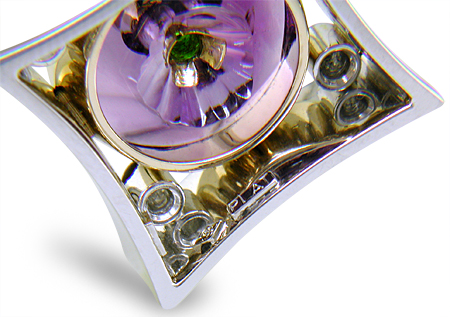 Amethyst torus and diamond pendant.
