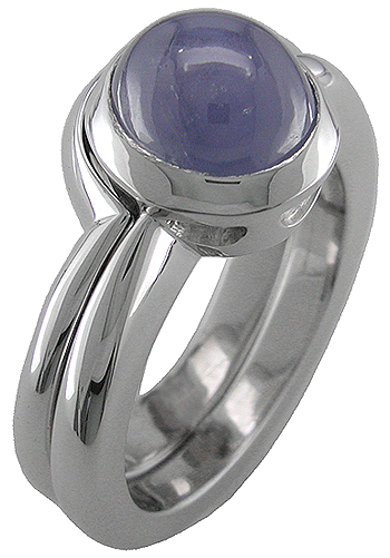 18kt white gold engagement ring with custom-fit wedding band.