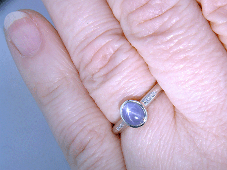 Star Sapphire and diamond platinum ring. (J7414)