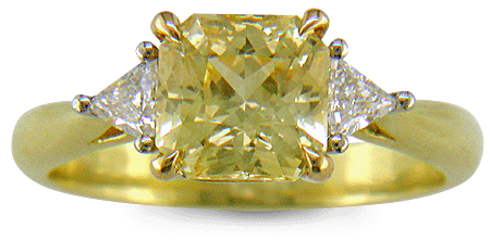 square-radiant-cut Yellow Sapphire set with two brilliant-cut diamonds in a handcrafted 18kt gold and platinum ring. (J8711)