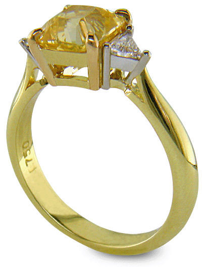 square-radiant-cut Yellow Sapphire set with two brilliant-cut diamonds in a handcrafted 18kt gold and platinum ring. (J8711)