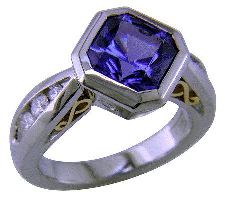 Tanzanite and diamond custom platinum ring.
