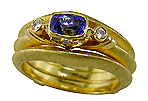 Hand-crafted 18kt gold tanzanite and diamond ring.