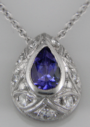 Tanzanite pendant with nine accenting diamonds.