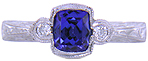 Tanzanite and diamond engraved ring. (J8708)