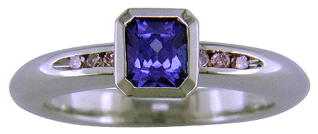 Custom platinum tanzanite and pink diamonds ring.