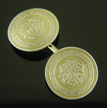 Taylor fleur-de-lys and tulip cufflinks. (J9172)