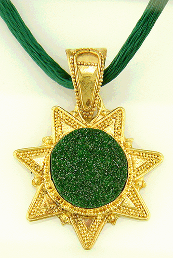 22kt gold star pendant with a drusy uvarovite garnet.