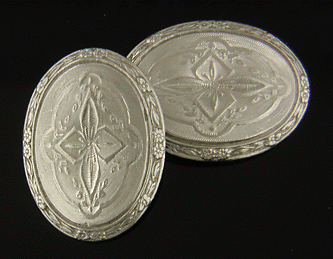 Antique gold cufflinks with a hint of Gothic Revival. (J8795)