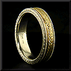 Engraved platinum and gold gentleman's wedding band.